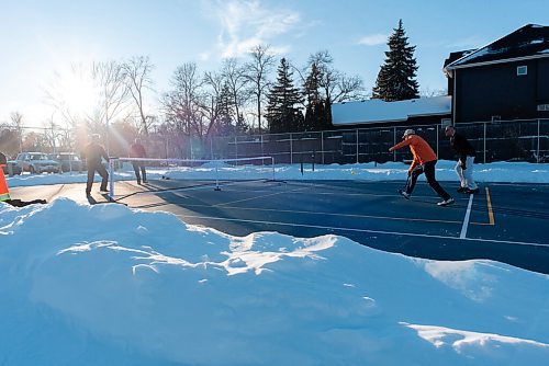 JESSE BOILY  / WINNIPEG FREE PRESS
Some men play some pickleball on the nice weather day at Wellington Park on Friday. Friday, Dec. 25, 2020.
Reporter:Standup