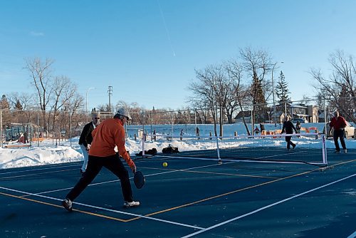 JESSE BOILY  / WINNIPEG FREE PRESS
Some men play some pickleball on the nice weather day at Wellington Park on Friday. Friday, Dec. 25, 2020.
Reporter:Standup