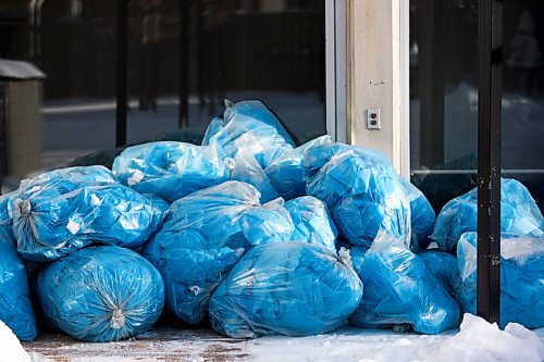 MIKAELA MACKENZIE / WINNIPEG FREE PRESS

Bags filled with used PPE overflow in the courtyard at The Convalescent Home of Winnipeg in Winnipeg on Thursday, Dec. 31, 2020. For Kevin Rollason story.

Winnipeg Free Press 2020