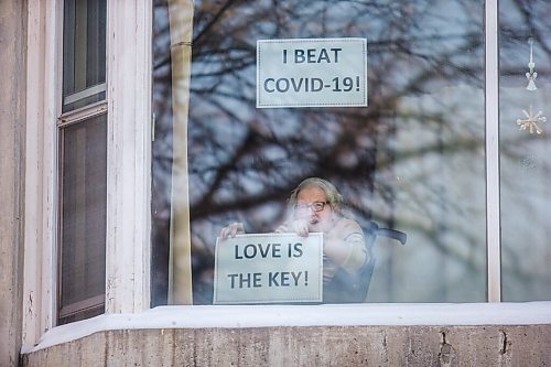 MIKAELA MACKENZIE / WINNIPEG FREE PRESS

Betty Lake, 93, poses for a portrait in her window with a message of hope for the new year at The Convalescent Home of Winnipeg in Winnipeg on Thursday, Dec. 31, 2020. For Kevin Rollason story.

Winnipeg Free Press 2020