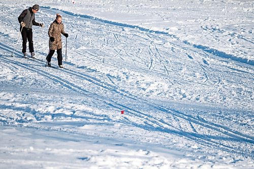 Daniel Crump / Winnipeg Free Press. Two cross country skiers work their way down the class ski track at Churchill Drive Park on Saturday afternoon. January 2, 2021.