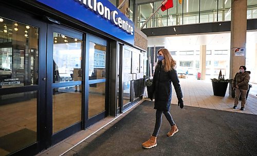 RUTH BONNEVILLE / WINNIPEG FREE PRESS

Local. COVID Vaccinations

Healthcare worker, Andrea Wilkie-Gilmore, makes her way to the entrance of the Convention Centre doors to get her vaccine on Monday.
See Ryan Thorpe story. 

Jan 04,. 2021