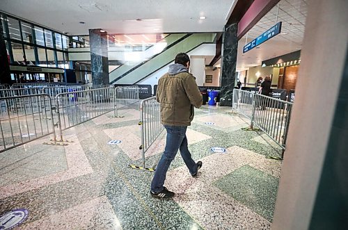 RUTH BONNEVILLE / WINNIPEG FREE PRESS

Local. COVID Vaccinations

A man makes his way through the cues to the front staff at the  vaccination site at the Convention Centre Monday. 

See Ryan Thorpe story. 

Jan 04,. 2021