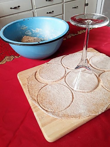 Canstar Community News A blue enamel bowl that once belonged to the correspondents mom sits beside whole wheat perogy dough cut with a glass holding only happy memories during Code Red Christmas 2020.