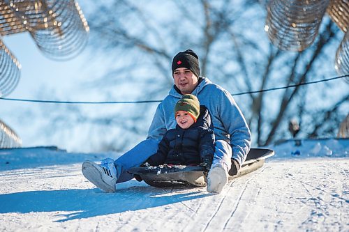 MIKAELA MACKENZIE / WINNIPEG FREE PRESS

Jaxx Kerfoot, three, toboggans with his dad, Norman Beauchamp, at The Forks in Winnipeg on Monday, Jan. 4, 2021. Standup.

Winnipeg Free Press 2020