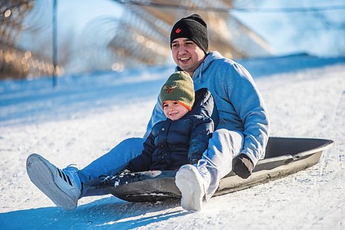 MIKAELA MACKENZIE / WINNIPEG FREE PRESS

Jaxx Kerfoot, three, toboggans with his dad, Norman Beauchamp, at The Forks in Winnipeg on Monday, Jan. 4, 2021. Standup.

Winnipeg Free Press 2020