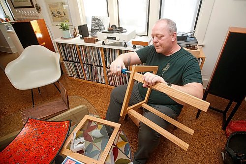 JOHN WOODS / WINNIPEG FREE PRESS
Ian Park, owner of 33 Racket, is photographed with his record storage racks at his home in Winnipeg Monday, January 4, 2021. 

Reporter: sanderson