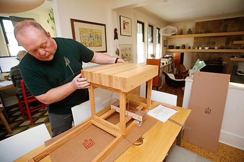 JOHN WOODS / WINNIPEG FREE PRESS
Ian Park, owner of 33 Racket, is photographed with his record storage racks at his home in Winnipeg Monday, January 4, 2021. 

Reporter: sanderson