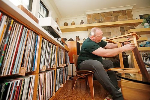 JOHN WOODS / WINNIPEG FREE PRESS
Ian Park, owner of 33 Racket, is photographed with his record storage racks at his home in Winnipeg Monday, January 4, 2021. 

Reporter: sanderson