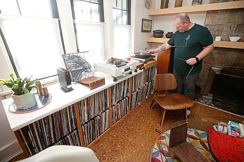 JOHN WOODS / WINNIPEG FREE PRESS
Ian Park, owner of 33 Racket, is photographed with his record storage racks at his home in Winnipeg Monday, January 4, 2021. 

Reporter: sanderson