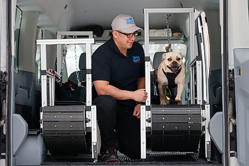 JOHN WOODS / WINNIPEG FREE PRESS
Tito Urbina, co-owner of Dog Dash - Mobile Dog Gym, is photographed with Luna in the mobile dog treadmill gym in Winnipeg Thursday, January 7, 2021. 

Reporter: Sanderson