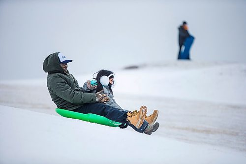 MIKAELA MACKENZIE / WINNIPEG FREE PRESS

Margaux Banzil, seven, and her dad toboggan at Westview Park in Winnipeg on Monday, Jan. 11, 2021. Standup.

Winnipeg Free Press 2020