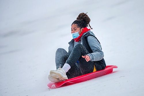 MIKAELA MACKENZIE / WINNIPEG FREE PRESS

Israella Delamothe toboggans at Westview Park in Winnipeg on Monday, Jan. 11, 2021. Standup.

Winnipeg Free Press 2020