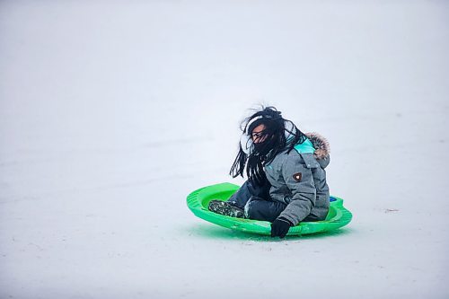 MIKAELA MACKENZIE / WINNIPEG FREE PRESS

Margaux Banzil, seven, toboggans at Westview Park in Winnipeg on Monday, Jan. 11, 2021. Standup.

Winnipeg Free Press 2020