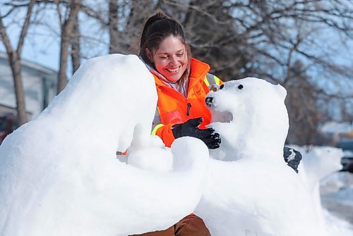 RUTH BONNEVILLE / WINNIPEG FREE PRESS

ENT - Snow Bears


Description: They are calling them Bears on Barrington.

A St. Vital woman who lives on Barrington Ave. has turned her front yard into a polar bear playground.

Vinora Bennett loves working on sculpting and designs her bears made of snow and water in her front yard.  

Sick of being trapped inside during the lockdown, Vinora Bennett has sculpted almost a dozen polar  mama bears, cubs, big angry bears  out of the snow in her yard.

Her snow-bear sculptures range in size and formation, hanging in a tree, playing with young cubs, fishing and standing next to a Christmas tree and have become a bit of a tourist attraction, like the Christmas lights displays in Linden Woods.


Jan 12,. 2021