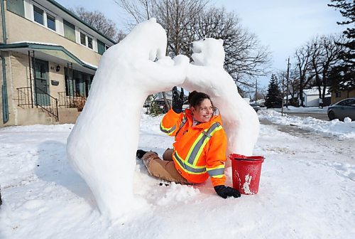 RUTH BONNEVILLE / WINNIPEG FREE PRESS

ENT - Snow Bears


Description: They are calling them Bears on Barrington.

A St. Vital woman who lives on Barrington Ave. has turned her front yard into a polar bear playground.

Vinora Bennett waves at a passerby on Dunkirk Ave. As she works on sculpting her bears made of snow and water in her front yard.  

Sick of being trapped inside during the lockdown, Vinora Bennett has sculpted almost a dozen polar  mama bears, cubs, big angry bears  out of the snow in her yard.

Her snow-bear sculptures range in size and formation, hanging in a tree, playing with young cubs, fishing and standing next to a Christmas tree and have become a bit of a tourist attraction, like the Christmas lights displays in Linden Woods.


Jan 12,. 2021