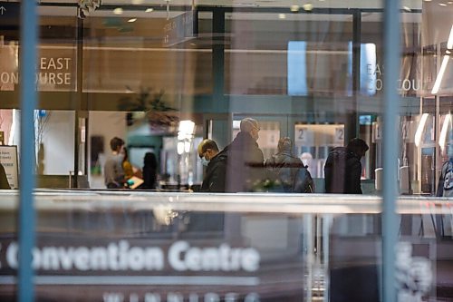 MIKE DEAL / WINNIPEG FREE PRESS
A steady stream of people can be seen entering the RBC Convention Centre vaccine supersite Wednesday morning.
210113 - Wednesday, January 13, 2021.