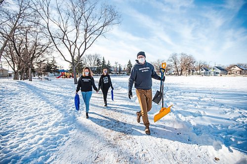 MIKAELA MACKENZIE / WINNIPEG FREE PRESS

Shannon Siemens (left), Joelle Suzuki, and Rex Ferguson-Baird walk to the toboggan slide at Brooklands School in Winnipeg on Wednesday, Jan. 13, 2021. Manitoba Eco-Network recently gave Brooklands School staff an award in recognition of their various environmental initiatives, which include holding all classes outdoors for the last six weeks of each school year (rain or shine) as a way to teach students how to appreciate nature. For Aaron Epp story.

Winnipeg Free Press 2021