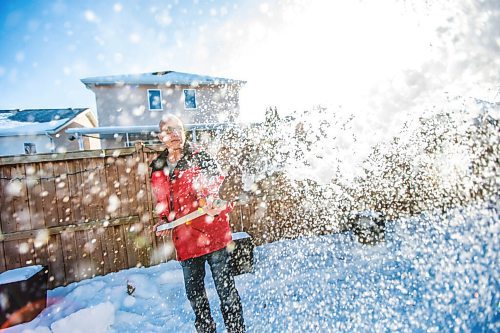 MIKAELA MACKENZIE / WINNIPEG FREE PRESS

Gordon Giesbrecht, a former wilderness instructor, and a professor of cold physiology, demonstrates throwing the snow in the air as a quinzee making technique in his back yard in Winnipeg on Wednesday, Jan. 13, 2021.  For Ben Waldman story.

Winnipeg Free Press 2021