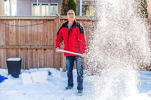 MIKAELA MACKENZIE / WINNIPEG FREE PRESS

Gordon Giesbrecht, a former wilderness instructor, and a professor of cold physiology, demonstrates throwing the snow in the air as a quinzee making technique in his back yard in Winnipeg on Wednesday, Jan. 13, 2021.  For Ben Waldman story.

Winnipeg Free Press 2021