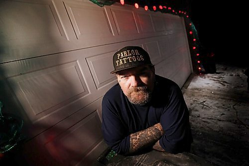 JOHN WOODS / WINNIPEG FREE PRESS
Phil McLellan, owner of Parlor Tattoo, is photographed outside his home in Winnipeg Wednesday, January 13, 2021. McLennan has received two tickets from health inspectors for opening his tattoo shop during COVID-19 red restriction.

Reporter: Abas