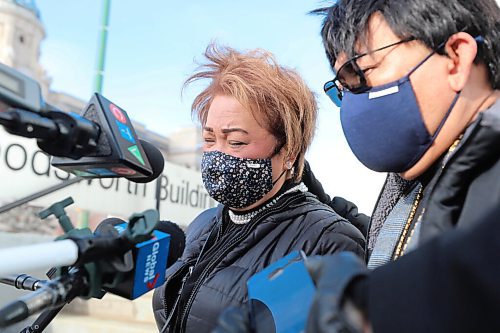 RUTH BONNEVILLE / WINNIPEG FREE PRESS


LOCAL - Adao sentencing


Imelda Adao, mother of Jamie Adao Jr. with her husband by her side, sheds tears as she speaks with the media outside the Woodwworth building after sentencing today.

Description:Sentencing took place this morning for killers of teen Jaime Adao. Both men entered guilty pleas for their roles in the teen's murder during a home invasion at the Adao family's McGee Street home on March 3, 2019. Family is present in court.

See Dean's story.




Jan 15,. 2021