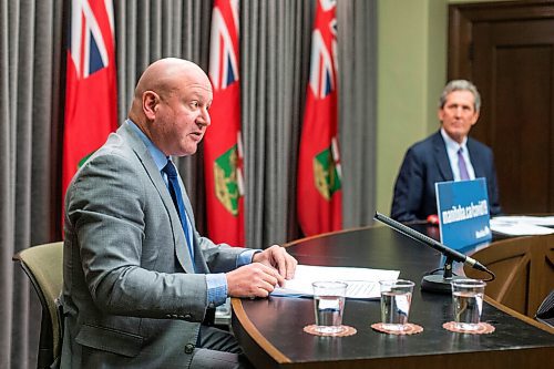 MIKAELA MACKENZIE / WINNIPEG FREE PRESS

Dr. Brent Roussin, chief provincial public health officer, and Premier Brian Pallister speak at a press conference at the Manitoba Legislative Building in Winnipeg on Friday, Jan. 15, 2021.  For Carol Sanders story.

Winnipeg Free Press 2021