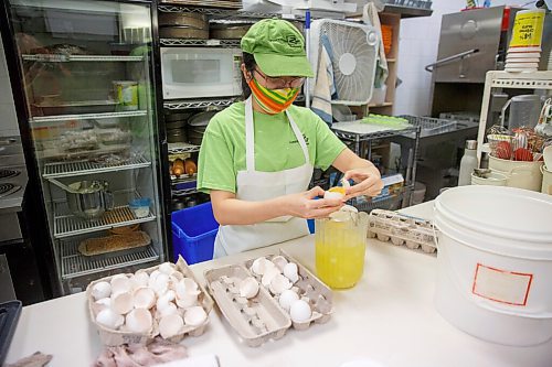 MIKE DEAL / WINNIPEG FREE PRESS
Chocolate Zen Bakery (553 Osborne Street) one of the city's top-notch bakeries.
Hannah Le separates eggs.
210115 - Friday, January 15, 2021.