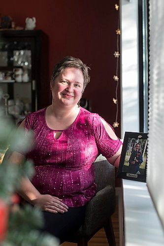 MIKAELA MACKENZIE / WINNIPEG FREE PRESS

Gloria Froese, former Church of God member, poses for a portrait with her graduation photo (from the time when she was with the church) at her home in Winnipeg on Friday, Jan. 15, 2021.  For Kevin story.

Winnipeg Free Press 2021