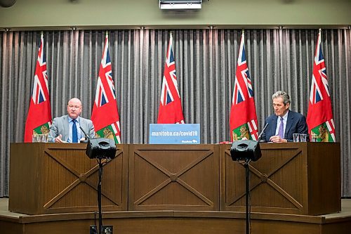 MIKAELA MACKENZIE / WINNIPEG FREE PRESS

Dr. Brent Roussin, chief provincial public health officer (left), and Premier Brian Pallister speak at a press conference at the Manitoba Legislative Building in Winnipeg on Friday, Jan. 15, 2021.  For Carol Sanders story.

Winnipeg Free Press 2021