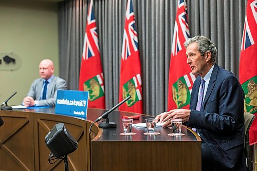 MIKAELA MACKENZIE / WINNIPEG FREE PRESS

Premier Brian Pallister (front) and Dr. Brent Roussin, chief provincial public health officer, speak at a press conference at the Manitoba Legislative Building in Winnipeg on Friday, Jan. 15, 2021.  For Carol Sanders story.

Winnipeg Free Press 2021