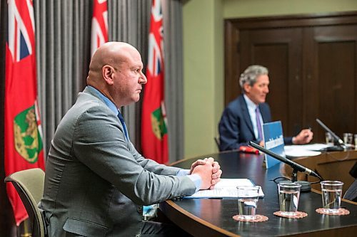 MIKAELA MACKENZIE / WINNIPEG FREE PRESS

Dr. Brent Roussin, chief provincial public health officer (left), and Premier Brian Pallister speak at a press conference at the Manitoba Legislative Building in Winnipeg on Friday, Jan. 15, 2021.  For Carol Sanders story.

Winnipeg Free Press 2021