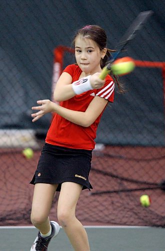 BORIS.MINKEVICH@FREEPRESS.MB.CA BORIS MINKEVICH/ WINNIPEG FREE PRESS  100120 Action of a junior tennis player Yuliya Andreyev,9, who will be competing in a tournament on Sunday at the Winter Club.