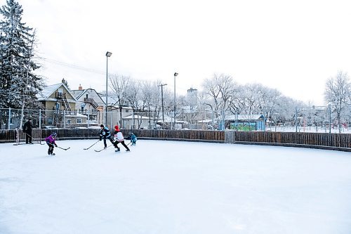 Daniel Crump / Winnipeg Free Press. People play pick-up hickey at the West Broadway Community Centre on Saturday morning. January 16, 2021.