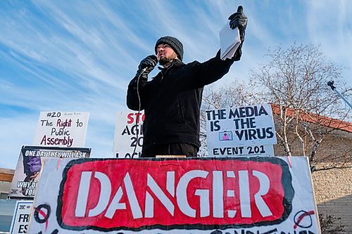 Daniel Crump / Winnipeg Free Press. Pastor Tobias Tissen speaks to protestors gathered at city hall in Steinbach, Manitoba. January 16, 2021.