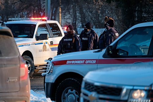 Daniel Crump / Winnipeg Free Press. RCMP keep and eye on an anti-mask protest outside city hall in Steinbach. The protest was organized by the group Hugs Over Masks. Manitoba. January 16, 2021.