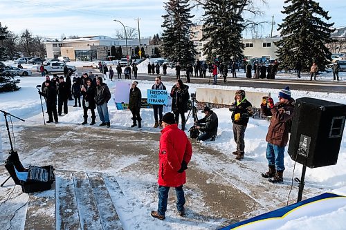 Daniel Crump / Winnipeg Free Press. Several dozen people attend a protest organized by the group Hugs Over Masks outside city hall in Steinbach, Manitoba. January 16, 2021.