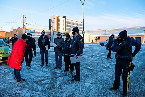 Daniel Crump / Winnipeg Free Press. Gerry Bohemier shouts at RCMP after being issued a ticket. Bohemier spoke at the Hugs Over Masks protest in Steinbach. January 16, 2021.