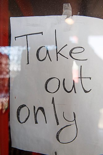 MIKE DEAL / WINNIPEG FREE PRESS
Various signs of many of the retail locations in Osborne Village that are either closed or only open for curb-side pick-up. 
See Temur Durrani story
210122 - Friday, January 22, 2021.