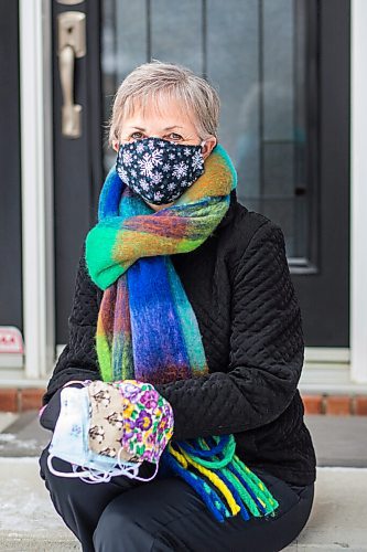 MIKAELA MACKENZIE / WINNIPEG FREE PRESS

Sharon Erickson-Nesmith poses with some of her hand-sewn masks at her home in Winnipeg on Friday, Jan. 22, 2021. For Brenda Suderman story.

Winnipeg Free Press 2021