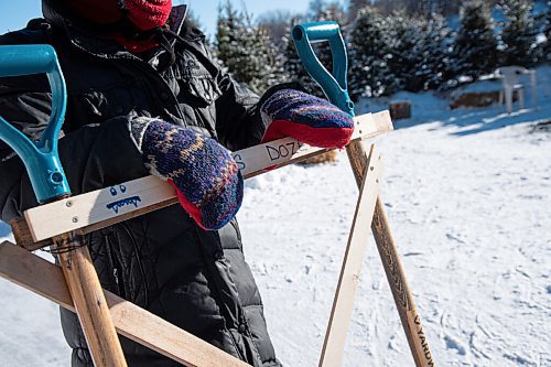 MIKE SUDOMA / WINNIPEG FREE PRESS
Beverlys Findlays home made mittens and the makeshift shovel she uses to clear the Assiniboine River trail
January 24, 2021