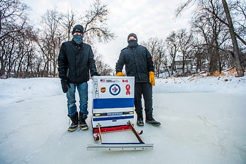 MIKAELA MACKENZIE / WINNIPEG FREE PRESS

Ron (left) and Anthony Thierault pose for a photo with their washing machine zamboni on the Seine River near Marion Street in Winnipeg on Monday, Jan. 25, 2021. For JS story.

Winnipeg Free Press 2021