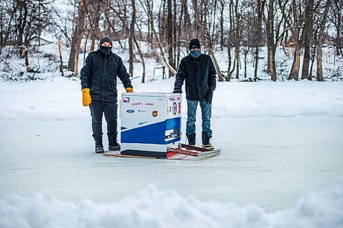 MIKAELA MACKENZIE / WINNIPEG FREE PRESS

Anthony (left) and Ron Thierault pose for a photo with their washing machine zamboni on the Seine River near Marion Street in Winnipeg on Monday, Jan. 25, 2021. For JS story.

Winnipeg Free Press 2021