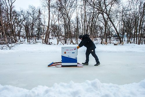 MIKAELA MACKENZIE / WINNIPEG FREE PRESS

Anthony Thierault demonstrates his washing machine zamboni (without water, since the extreme cold temperatures make it stick to the ice) on the Seine River near Marion Street in Winnipeg on Monday, Jan. 25, 2021. For JS story.

Winnipeg Free Press 2021
