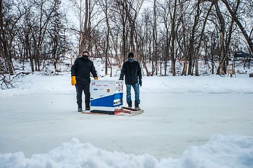 MIKAELA MACKENZIE / WINNIPEG FREE PRESS

Ron and Anthony Thierault pose for a photo with their washing machine zamboni on the Seine River near Marion Street in Winnipeg on Monday, Jan. 25, 2021. For JS story.

Winnipeg Free Press 2021