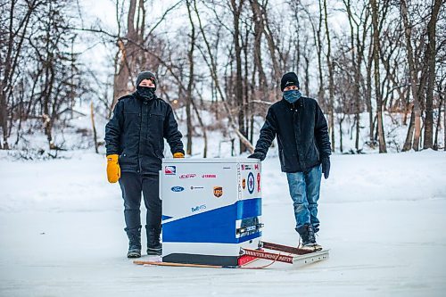 MIKAELA MACKENZIE / WINNIPEG FREE PRESS

Anthony (left) and Ron Thierault pose for a photo with their washing machine zamboni on the Seine River near Marion Street in Winnipeg on Monday, Jan. 25, 2021. For JS story.

Winnipeg Free Press 2021