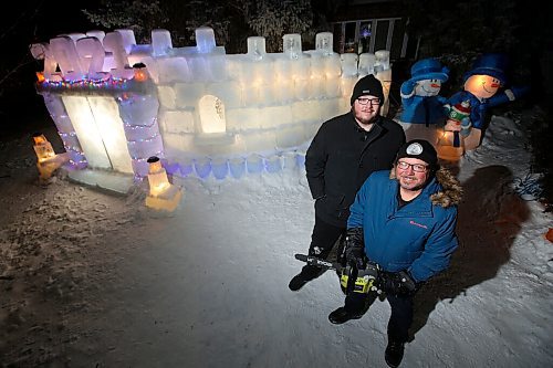 JOHN WOODS / WINNIPEG FREE PRESS
Dave Robinson, right, and his son Stephen have built a 40 by 8 foot ice castle in their North Kildonan front yard in Winnipeg Monday, January 25, 2021. 

Reporter: ?