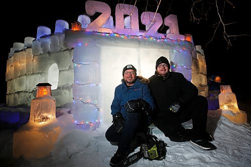 JOHN WOODS / WINNIPEG FREE PRESS
Dave Robinson, left, and his son Stephen have built a 40 by 8 foot ice castle in their North Kildonan front yard in Winnipeg Monday, January 25, 2021. 

Reporter: ?