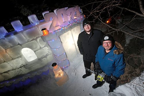 JOHN WOODS / WINNIPEG FREE PRESS
Dave Robinson, right, and his son Stephen have built a 40 by 8 foot ice castle in their North Kildonan front yard in Winnipeg Monday, January 25, 2021. 

Reporter: ?