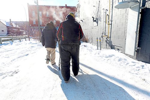 RUTH BONNEVILLE / WINNIPEG FREE PRESS

Local - Extreme Cold, COVID & Homeless seeking shelter

People seek shelter at Main Street Project from the extreme cold temperatures Tuesday.

Winston Yellowback (cream pants) and his friend Peter Blackhawk make their way back to Main Street Project shelter on Tuesday.   

See Ryan Thorpe story.


Jan 26,. 2021